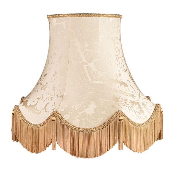 Charlie cream damask with gold fringe and tassels.