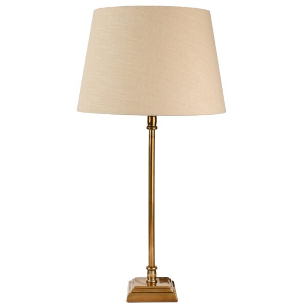 medium square base antique brass stick lamp with natural tapered linen shade